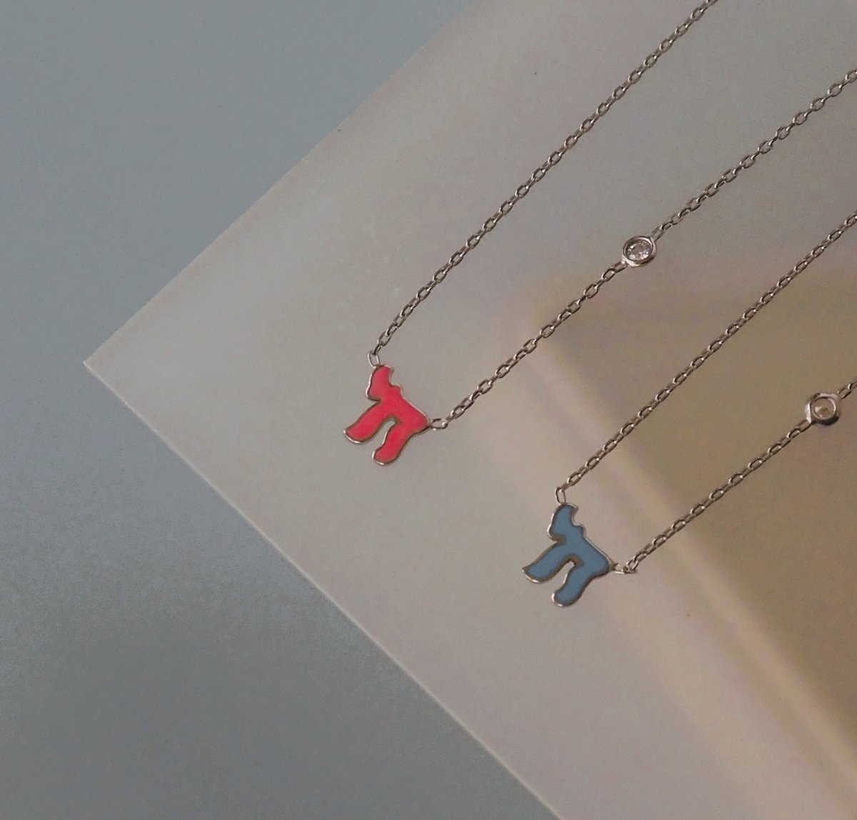 Chai Hebrew Necklace with a Sparkling Gemstone in Pink or Blue