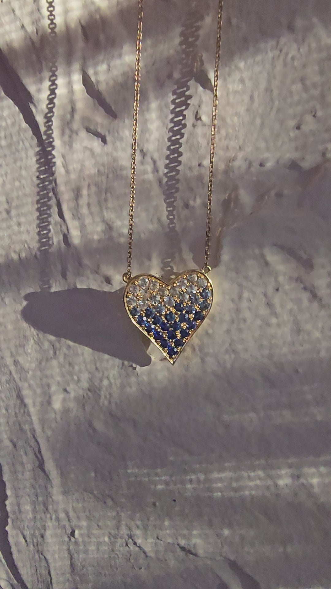 blue heart in gold