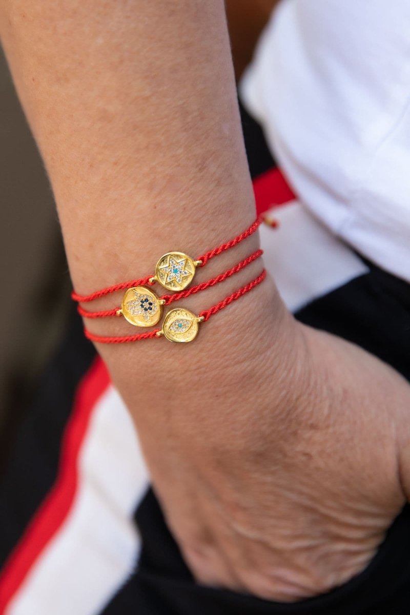 Red online string ring with gold